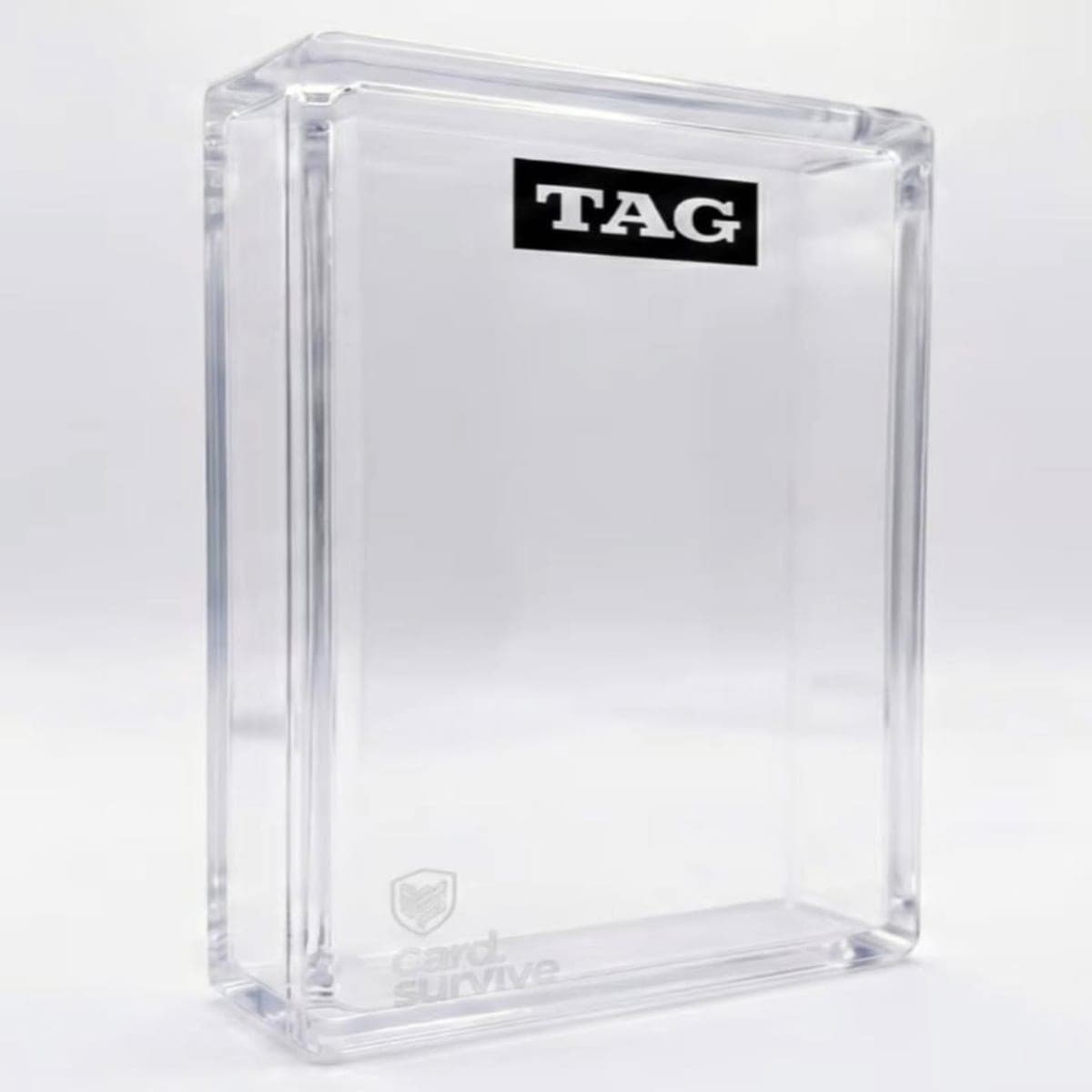 The Tank TAG & CGC slab protector shown empty at a three-quarter angle on a white background, with the TAG mark on the front panel.